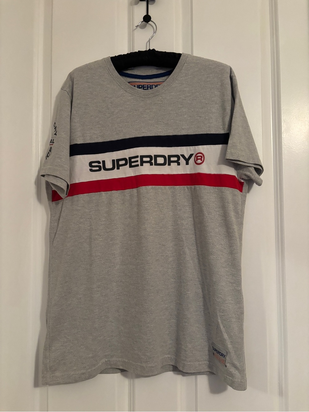 Superdry Grey Tee with Navy & Red Chest Stripes.  Size XL.